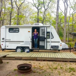 I take any opportunity I can to share pictures of the camper we lived in last summer. The ends pop-out, so our living space was slightly larger than it appears here. We'd eventually set-up a tent room on the deck and made it look a lot more homey too.