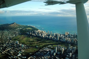 Our first glimpses of Waikiki on our puddle jumper over from Molokai. In the group of tall building by the shore (Waikiki), the building we living in during 2010 is the furthest to the left.